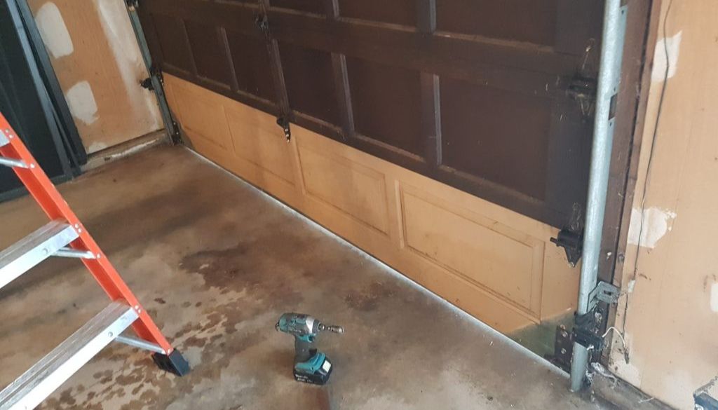 How Hard Is It to Repair a Wooden Garage Door